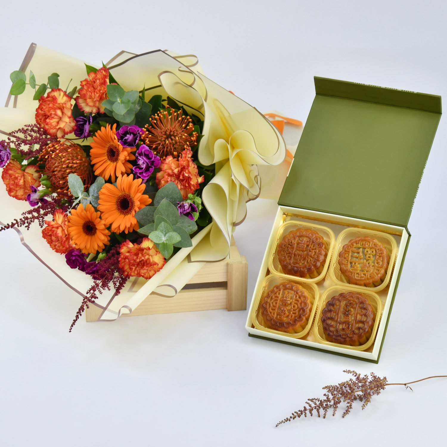 Online Mesmeric Flowers Bouquet And Moon Cake Gift Delivery in UAE FNP